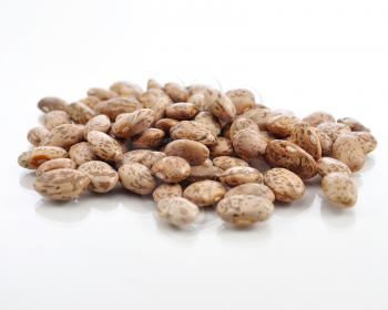 raw beans on white background