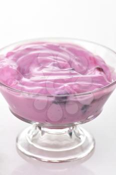 a Bowl of strawberry yogurt , close up

