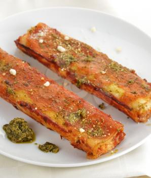 Cannelloni With Cheese , Tomato Sauce And Basil Pesto