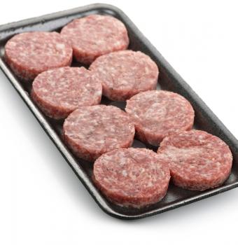Raw Beef Burgers In A Packaging Tray 