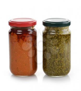 Glass Jars Of Tomato And Basil Pesto Sauce