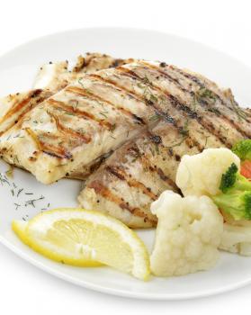 Grilled Fish Fillet With Vegetables And Lemon