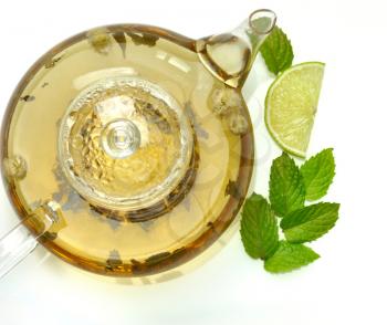 green tea composition with teapot,,lime and peppermint 
