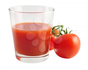 a glass of tomatoe juice with fresh tomatoes