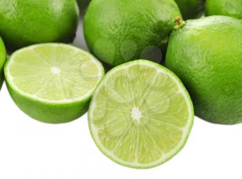 lime fruits on white background, close up
