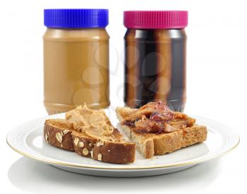 Peanut Butter toasts  and  jars on white background