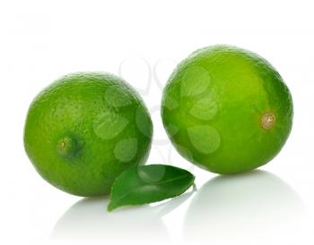 Limes with leaf on a white background 