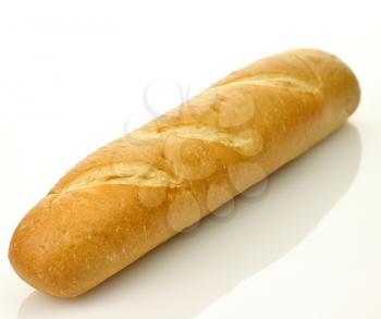 A loaf of fresh baked french or italian bread on a white background