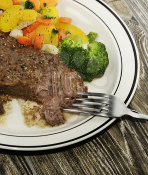 Plate Of Baked Beef With Vegetables