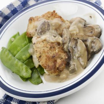 Chicken Breast In Mushroom Sauce With Green Peas