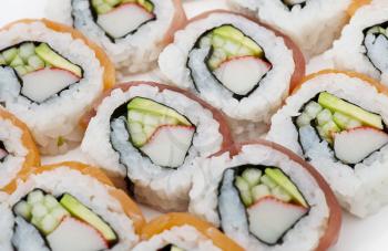 Sushi rolls assortment close up on white background