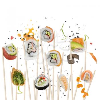 sushi rolls and ingredients with wooden chopsticks isolated on white background