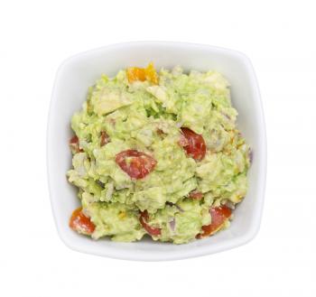 Bowl with homemade Guacamole isolated on white background