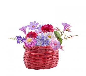 Colorful flowers in a basket isolated on white background