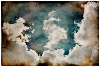 Grunge old paper with cloudy sky, retro style background