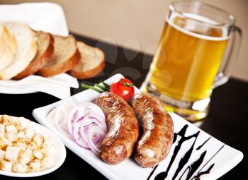 Grilled sausage with beer 
