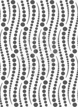 Monochrome dotted texture. Abstract seamless pattern. Ornament made of dots.Textured with dots vertical abstract snakes.