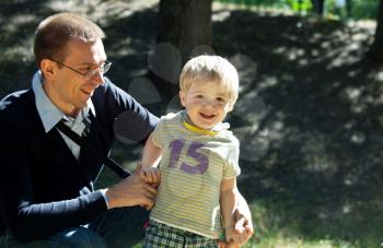 Royalty Free Photo of a Boy and Father