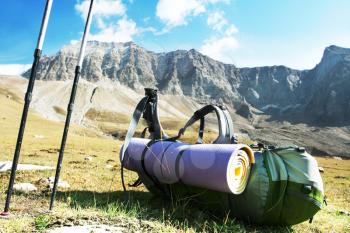 Royalty Free Photo of a Backpack in the Mountains