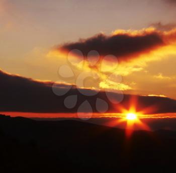 Royalty Free Photo of a Sunrise in the Mountains