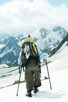 Royalty Free Photo of a Hiker in the Mountains