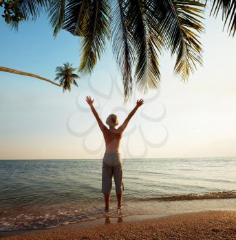 Royalty Free Photo of a Boy on a Beach