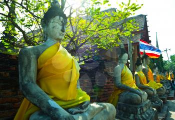 Royalty Free Photo of a Row of Buddha Statues