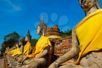 Royalty Free Photo of a Row of Buddha Statues