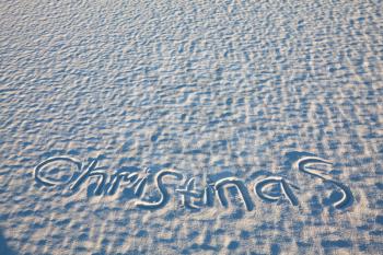 Royalty Free Photo of Christmas Written in the Snow