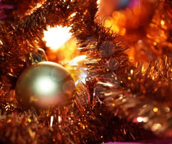 Royalty Free Photo of a Christmas Ball and Garland