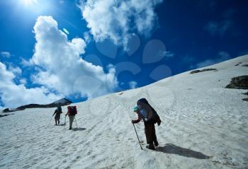 Royalty Free Photo of Hikers on a Snowy Mountain