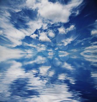 Royalty Free Photo of Clouds Over Water