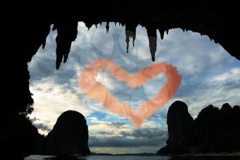 Royalty Free Photo of a Heart Cloud Through a Cave