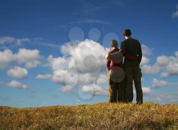 Royalty Free Photo of a Man and Woman Embracing