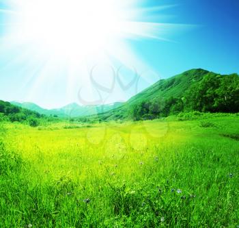 Royalty Free Photo of a Field in the Mountains