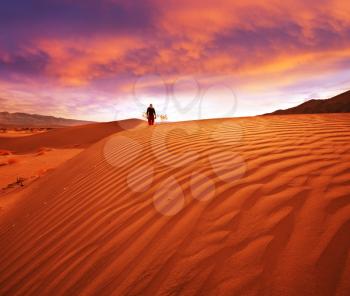 Royalty Free Photo of a Person Hiking in Death Valley National Park, USA