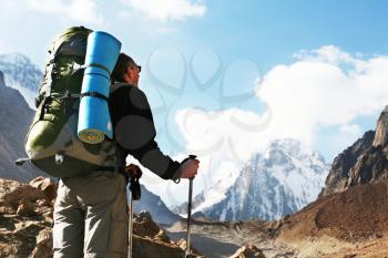 Royalty Free Photo of a Man Hiking in the Mountains