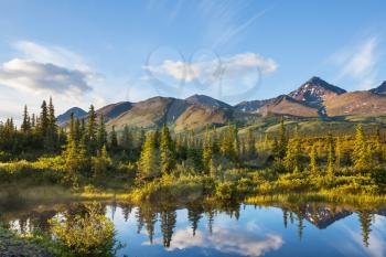 Royalty Free Photo of a River, Tundra and Mountains in Alaska