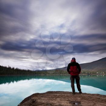 Royalty Free Photo of a Man at a Mountain Lake