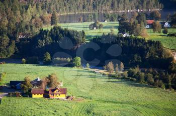 Royalty Free Photo of Houses and Fields in Norway