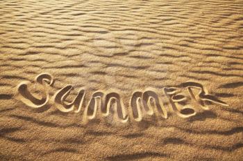 Royalty Free Photo of the Word Summer Written in the Sand