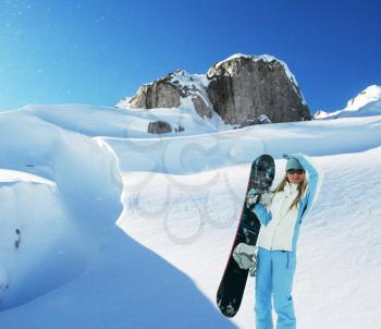 Royalty Free Photo of a Snowboarder