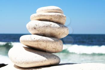 Royalty Free Photo of Stacked Rocks at a Beach
