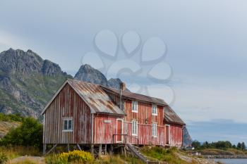 Red wooden fishing cabins in   Norway