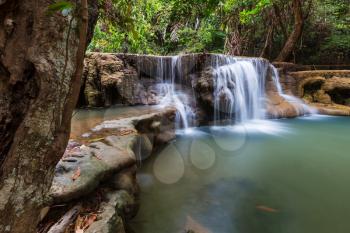 Beautiful waterfall in rainforest, Kanchanaburi province, Southeast asia, Thailand