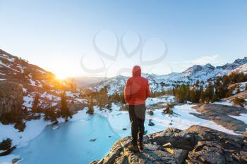 Man with hiking equipment walking in Sierra Nevada mountains, California, USA