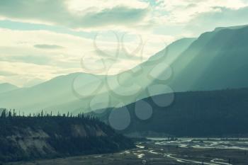 Picturesque Mountains of Alaska in summer. Snow covered massifs, glaciers and rocky peaks.