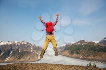 Jumping man in volcanic mountains, Bromo, Indonesia