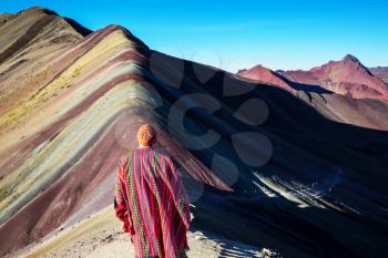 Hiking scene in Vinicunca, Cusco Region, Peru. Montana de Siete Colores,  Rainbow Mountain.