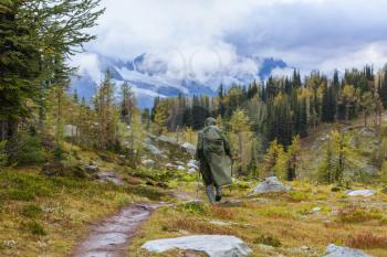 Hike in the autumn mountains. Fall season theme.